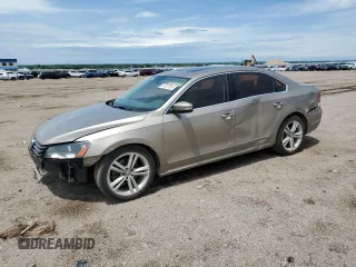 2015 Volkswagen Passat SEL Premium with VIN 1VWCV7A34FC098230, listed as a Copart auction lot 61137755 with 166,987 mi miles and Salvage title. Bid and sale history available at DreamBid. Image 1.