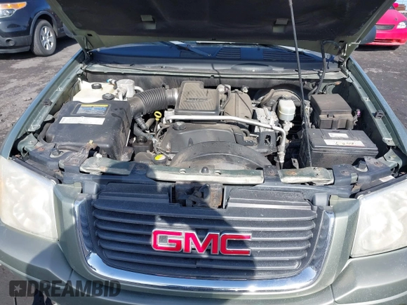 2004 GMC Envoy SLE with VIN 1GKDT13S942254932, listed as a IAAI auction lot 41509407 with 213,068 mi miles. Bid and sale history available at carsss.com. Image 10.