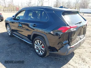 2021 Toyota RAV4 XLE Premium with VIN 2T3A1RFV6MC236809, listed as a IAAI auction lot 42056379 with 99,921 mi miles and . Bid and sale history available at DreamBid. Image 3.