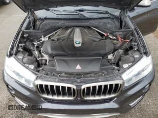 2018 BMW X6 xDrive50i with VIN 5UXKU6C5XJ0W39056, listed as a Copart auction lot 75116634 with 90,043 mi miles and Salvage Title. Bid and sale history available at carsss.com. Image 12.