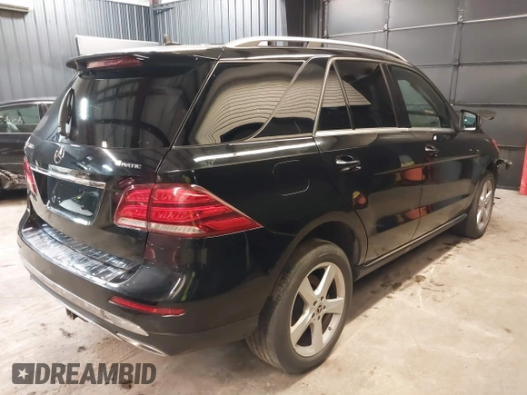2019 Mercedes-Benz GLE 400 with VIN 4JGDA5GBXKB216718, listed as a IAAI auction lot 42531879 with 95,734 mi miles and . Bid and sale history available at DreamBid. Image 4.