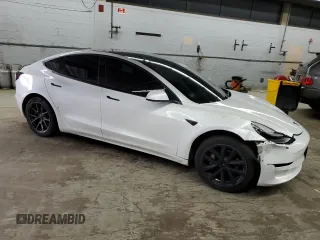 2021 Tesla Model 3 Standard Range Plus z VIN 5YJ3E1EA4MF943036, wystawiony jako Copart lot #54008355 z przebiegiem 62 981 mil mil oraz Szkoda całkowita • Salvage title. Historia ofert i sprzedaży dostępna na DreamBid. Obrazek 4.