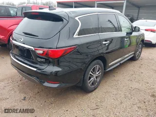 2019 Infiniti QX60 LUXE with VIN 5N1DL0MN3KC552717, listed as a IAAI auction lot 41602730 with 63,808 mi miles. Bid and sale history available at carsss.com. Image 4.