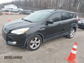 2015 Ford Escape SE with VIN 1FMCU9G90FUC66187, listed as a IAAI auction lot 41678861 with 284,548 mi miles and . Bid and sale history available at DreamBid. Image 2.