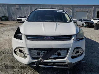 2013 Ford Escape SE with VIN 1FMCU0GX3DUA19981, listed as a Copart auction lot 60905255 with 212,730 mi miles and Salvage title. Bid and sale history available at DreamBid. Image 5.