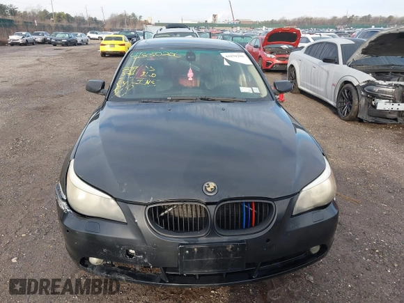 2007 BMW 5 Series 525i with VIN WBANE535X7CW59611, listed as a IAAI auction lot 41850206 with 209,571 mi miles and . Bid and sale history available at carsss.com. Image 12.