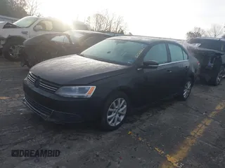 2014 Volkswagen Jetta Sedan SE with VIN 3VWD17AJ1EM322226, listed as a IAAI auction lot 41211984 with 217,084 mi miles. Bid and sale history available at carsss.com. Image 17.