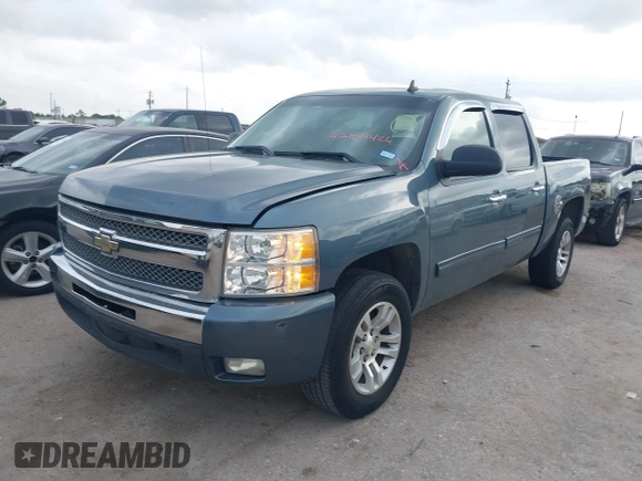2011 Chevrolet Silverado 1500 LT with VIN 3GCPCSE02BG349749, listed as a IAAI auction lot 42154426 with 184,815 mi miles and . Bid and sale history available at DreamBid. Image 2.