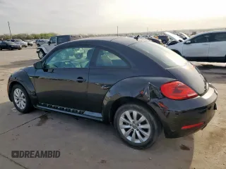 2014 Volkswagen Beetle Entry z VIN 3VWF17AT4EM641582, wystawiony jako Copart lot #50631035 z przebiegiem 121 461 mil mil oraz Szkoda całkowita • Salvage title. Historia ofert i sprzedaży dostępna na DreamBid. Obrazek 2.