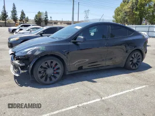 2022 Tesla Model Y Performance z VIN 7SAYGDEF2NF443037, wystawiony jako Copart lot #56870145 z przebiegiem 51 897 mil mil oraz Szkoda całkowita • Salvage title. Historia ofert i sprzedaży dostępna na DreamBid. Obrazek 1.