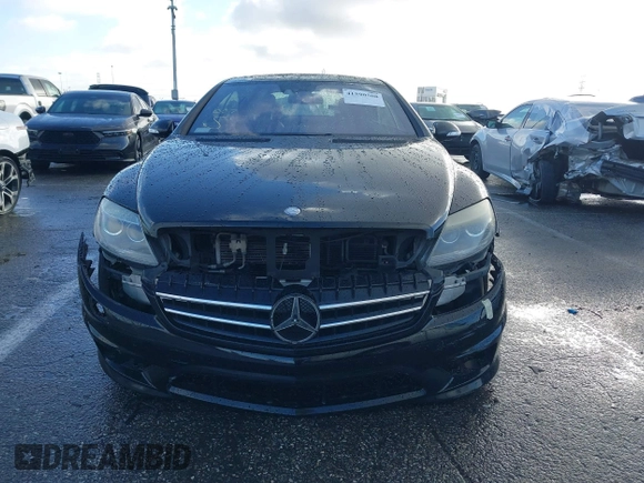 2009 Mercedes-Benz CL-Class V8 AMG with VIN WDDEJ77X89A020041, listed as a IAAI auction lot 41590508 with 127,040 mi miles. Bid and sale history available at carsss.com. Image 13.