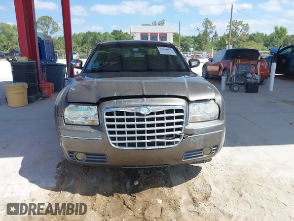 2010 Chrysler 300 Touring with VIN 2C3CA5CV5AH233033, listed as a IAAI auction lot 42130676 with 158,323 mi miles and . Bid and sale history available at DreamBid. Image 6.