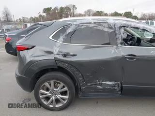 2022 Mazda CX-30 S Premium with VIN 3MVDMBDL9NM434619, listed as a IAAI auction lot 41620655 with 46,557 mi miles and . Bid and sale history available at carsss.com. Image 6.