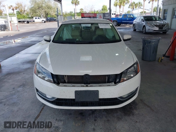 2015 Volkswagen Passat 1.8T Limited Edition with VIN 1VWAT7A3XFC100852, listed as a IAAI auction lot 41204902 with 85,725 mi miles. Bid and sale history available at carsss.com. Image 12.