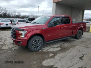 2015 Ford F-150 XLT w/HD Payload Pkg with VIN 1FTFW1EG9FFA35744, listed as a Copart auction lot 51133275 with 128,006 mi miles and Salvage Title. Bid and sale history available at carsss.com. Image 1.
