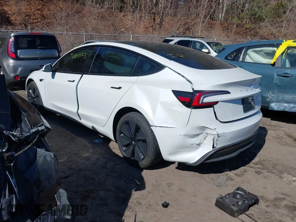 2025 Tesla Model 3 Long Range with VIN 5YJ3E1EB4SF914979, listed as a IAAI auction lot 41695023 with 2,263 mi miles and . Bid and sale history available at DreamBid. Image 3.