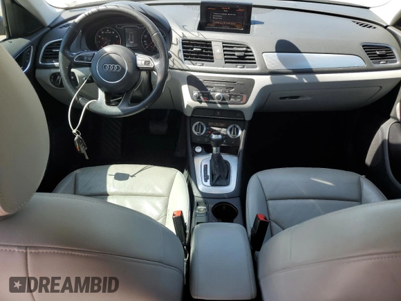 2015 Audi Q3 Premium Plus with VIN WA1BFCFS1FR004865, listed as a Copart auction lot 53348405 with 130,521 mi miles and Salvage title. Bid and sale history available at DreamBid. Image 8.