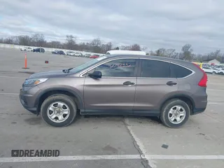 2015 Honda CR-V LX with VIN 5J6RM4H35FL127992, listed as a IAAI auction lot 42042332 with 141,642 mi miles and . Bid and sale history available at DreamBid. Image 14.