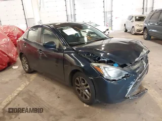 2016 Scion iA z VIN 3MYDLBZV5GY103533, wystawiony jako IAAI lot #41756270 z przebiegiem 59 290 mil mil oraz . Historia ofert i sprzedaży dostępna na DreamBid. Obrazek 1.