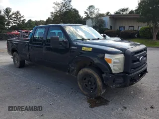2014 Ford F-250 XL with VIN 1FT7W2A6XEEB36013, listed as a Copart auction lot 62713075 with 245,865 mi miles and Salvage title. Bid and sale history available at DreamBid. Image 4.
