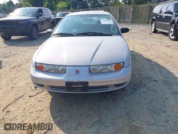 2001 Saturn SL z VIN 1G8ZK52771Z269242, wystawiony jako IAAI lot #42425226 z przebiegiem 129 539 mil mil oraz . Historia ofert i sprzedaży dostępna na DreamBid. Obrazek 6.