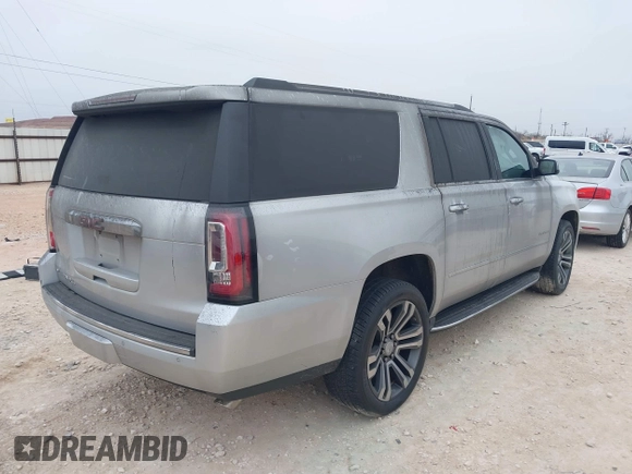 2019 GMC Yukon XL Denali with VIN 1GKS1HKJ0KR257673, listed as a IAAI auction lot 41375951 with 71,291 mi miles. Bid and sale history available at carsss.com. Image 4.