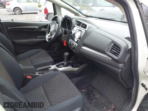 2017 Honda Fit LX with VIN JHMGK5H58HS021117, listed as a IAAI auction lot 42026243 with 94,953 mi miles. Bid and sale history available at carsss.com. Image 5.