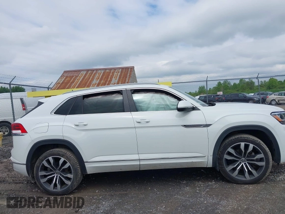 2021 Volkswagen Atlas SEL z VIN 1V2SE2CA7MC214805, wystawiony jako IAAI lot #42374591 z przebiegiem 61 775 mil mil oraz . Historia ofert i sprzedaży dostępna na DreamBid. Obrazek 14.
