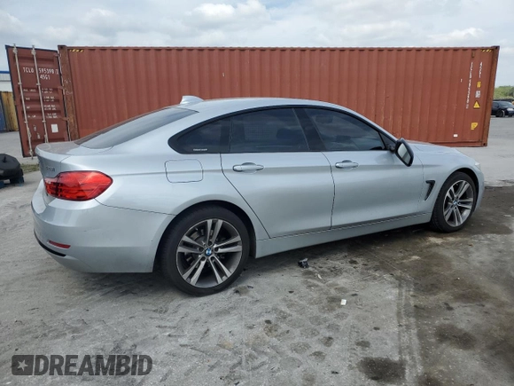 2015 BMW 4 Series 428i xDrive with VIN WBA4C9C55FD331210, listed as a Copart auction lot 54158235 with 88,372 mi miles and Salvage title. Bid and sale history available at DreamBid. Image 3.