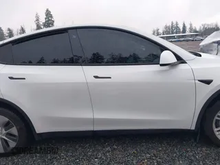 2022 Tesla Model Y Long Range z VIN 7SAYGDEE6NF451259, wystawiony jako IAAI lot #41200775 z przebiegiem 59 683 mil mil oraz . Historia ofert i sprzedaży dostępna na DreamBid. Obrazek 14.