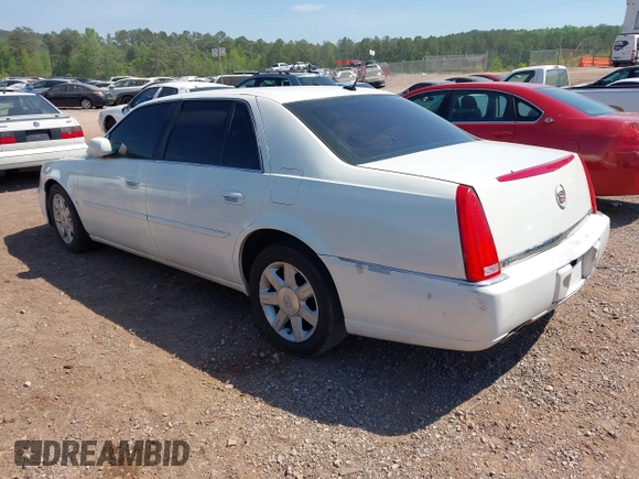 2006 Cadillac DTS w/1SC with VIN 1G6KD57Y36U116528, listed as a IAAI auction lot 42063595 with 128,839 mi miles. Bid and sale history available at carsss.com. Image 3.