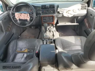 1998 Isuzu Rodeo S with VIN 4S2CM58W8W4368553, listed as a Copart auction lot 71313904 with 183,059 mi miles and Salvage Title. Bid and sale history available at carsss.com. Image 8.