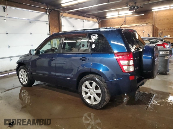 2012 Suzuki Grand Vitara Limited z VIN JS3TD0D77C4101382, wystawiony jako Copart lot #60017895 z przebiegiem 118 024 mil mil oraz Szkoda całkowita • Salvage title. Historia ofert i sprzedaży dostępna na DreamBid. Obrazek 2.