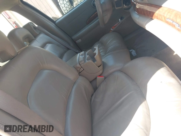 2001 Buick LeSabre Limited z VIN 1G4HR54K11U139710, wystawiony jako IAAI lot #42124376 z przebiegiem 182 187 mil mil oraz . Historia ofert i sprzedaży dostępna na DreamBid. Obrazek 5.