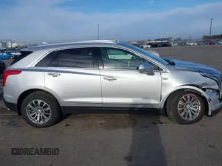 2019 Cadillac XT5 Luxury AWD with VIN 1GYKNDRS5KZ242037, listed as a IAAI auction lot 41963366 with 67,769 mi miles and . Bid and sale history available at carsss.com. Image 13.