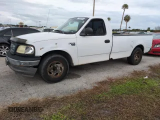2003 Ford F-150 XL with VIN 1FTRF17W03NA02988, listed as a Copart auction lot 77209084 with Not Provided miles and Salvage Title. Bid and sale history available at DreamBid. Image 1.