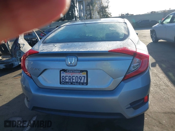2018 Honda Civic LX with VIN 2HGFC2F58JH571072, listed as a IAAI auction lot 41684450 with 66,032 mi miles and . Bid and sale history available at carsss.com. Image 16.