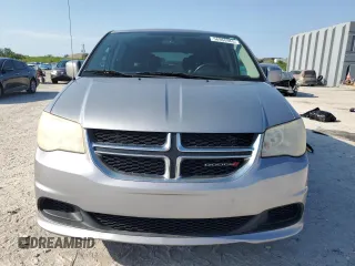 2014 Dodge Grand Caravan SXT z VIN 2C4RDGCG6ER223900, wystawiony jako Copart lot #56960965 z przebiegiem 101 275 mil mil oraz Szkoda całkowita • Salvage title. Historia ofert i sprzedaży dostępna na DreamBid. Obrazek 5.