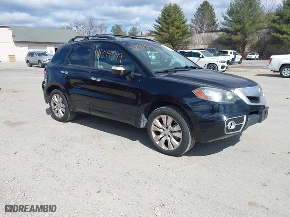 2010 Acura RDX Tech Pkg with VIN 5J8TB1H59AA007779, listed as a IAAI auction lot 41894049 with 198,735 mi miles. Bid and sale history available at carsss.com. Image 1.