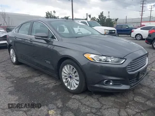 2016 Ford Fusion Energi SE Luxury with VIN 3FA6P0PU6GR165971, listed as a IAAI auction lot 41417233 with 118,240 mi miles. Bid and sale history available at carsss.com. Image 1.