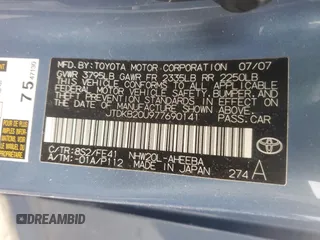 2007 Toyota Prius z VIN JTDKB20U977690141, wystawiony jako Copart lot #57838035 z przebiegiem Nie podano mil oraz Szkoda całkowita • Salvage title. Historia ofert i sprzedaży dostępna na DreamBid. Obrazek 12.