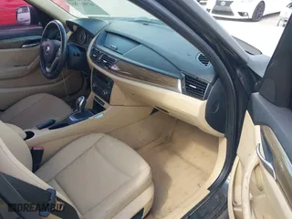 2015 BMW X1 sDrive28i with VIN WBAVM1C56FV314381, listed as a IAAI auction lot 41961245 with 68,182 mi miles. Bid and sale history available at carsss.com. Image 5.