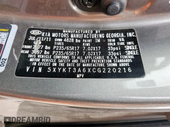 2012 Kia Sorento LX z VIN 5XYKT3A6XCG220216, wystawiony jako Copart lot #57467095 z przebiegiem 116 672 mil mil oraz Szkoda całkowita • Salvage title. Historia ofert i sprzedaży dostępna na DreamBid. Obrazek 12.