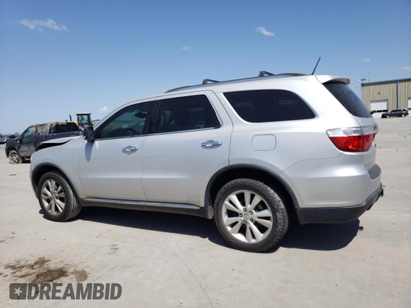 2013 Dodge Durango Crew with VIN 1C4SDHDTXDC552531, listed as a Copart auction lot 50353595 with 181,386 mi miles and Salvage title. Bid and sale history available at DreamBid. Image 2.