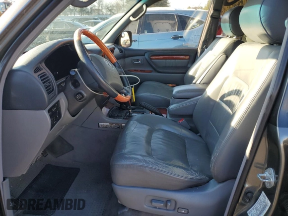 2000 Lexus LX 470 z VIN JT6HT00W1Y0084900, wystawiony jako Copart lot #41480235 z przebiegiem 213 577 mil mil oraz Szkoda całkowita • Salvage title. Historia ofert i sprzedaży dostępna na DreamBid. Obrazek 7.