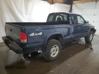 2004 Dodge Dakota Sport with VIN 1D7HG32N54S525290, listed as a Copart auction lot 77141804 with 217,012 mi miles and Salvage Title. Bid and sale history available at carsss.com. Image 3.