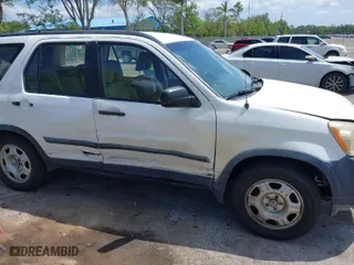 2005 Honda CR-V LX with VIN JHLRD68565C005484, listed as a IAAI auction lot 41983513 with 215,839 mi miles. Bid and sale history available at carsss.com. Image 6.