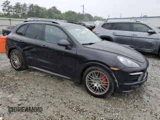 2013 Porsche Cayenne GTS с VIN WP1AD2A23DLA75220, выставлен на аукционе Copart как лот 55745765 с пробегом Не указан миль и Списание • Salvage title. История ставок и продаж доступна на DreamBid. Изображение 4.