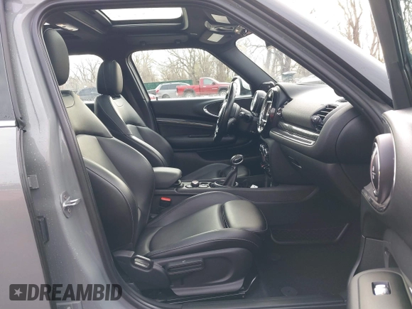 2017 MINI Clubman Cooper S with VIN WMWLU5C59H2E83705, listed as a IAAI auction lot 41853702 with 135,905 mi miles. Bid and sale history available at carsss.com. Image 5.