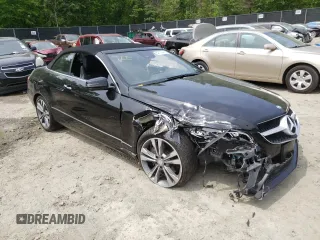 2015 Mercedes-Benz E 400 with VIN WDDKK6FFXFF295735, listed as a Copart auction lot 52134483 with 36,835 mi miles and Salvage title. Bid and sale history available at DreamBid. Image 4.